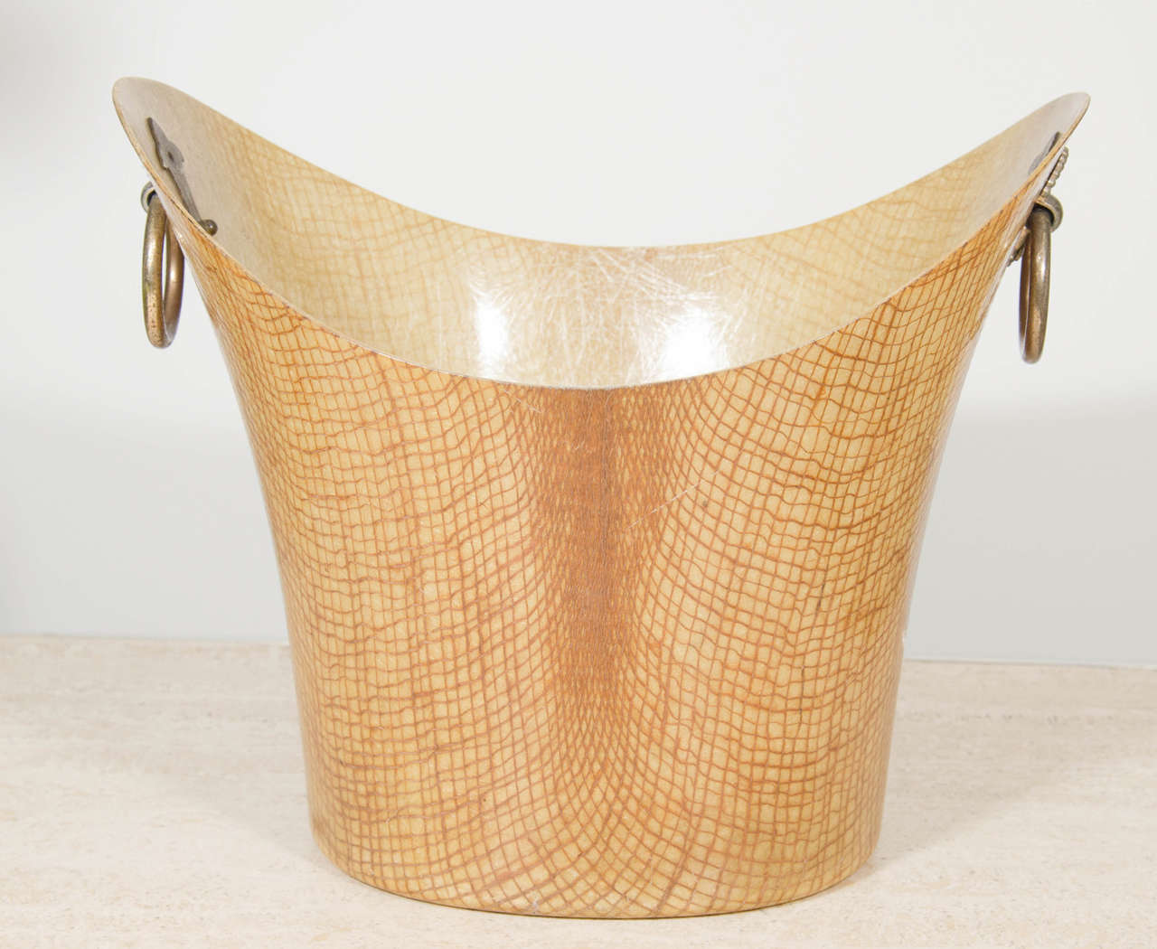 Modernist Kimball laminated trash bin, curved top with ring handles.