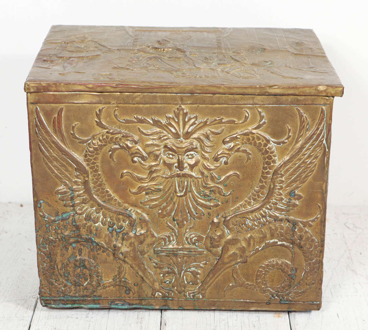 One-of-a-kind hammered metal box with dragon and god theme.