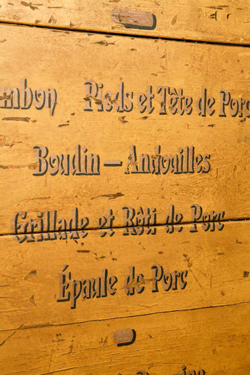 Wood French restaurant menu sign