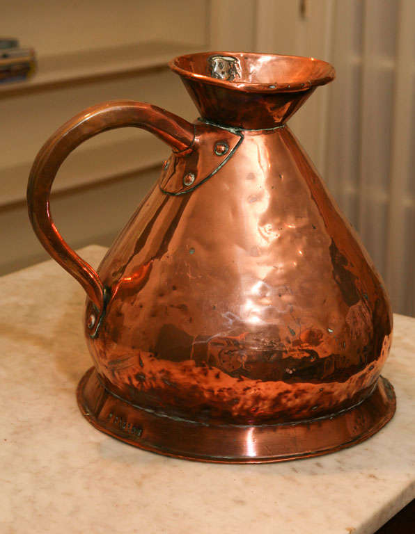 This ale jug, came from a brewery in the southern part of the UK. it is in copper and beautifully hammered, as authentic as can possibly be. It is quite large and would look beautiful in a kitchen , dining room or a display piece on a piece of