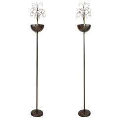 Pair of Art Deco Patinated Bronze Torcheres with Glass Orbs