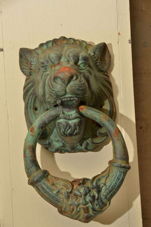 Cast iron Lion Head door knocker with bronze patina
