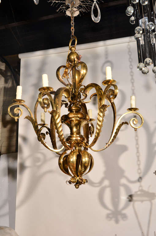 French six-arm brass chandelier, circa 1940s.