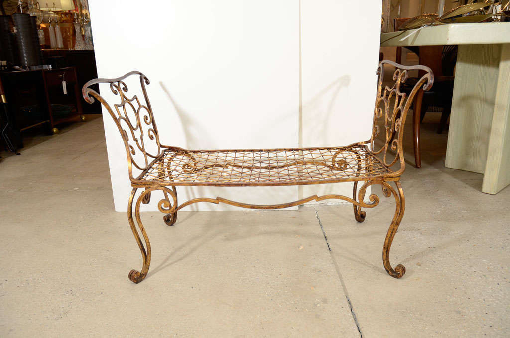 Classically styled gilt iron bench by Jean Charles Moreux.