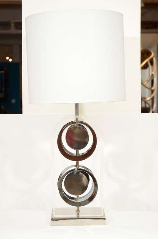 Fantastic pair of acrylic and chrome disc lamps by Laurel.