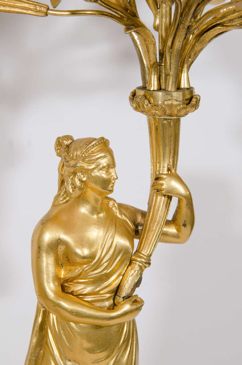 Hand-Carved Pair of Large Antique French Louis XVI Style Gilt Bronze Figural Candelabras For Sale