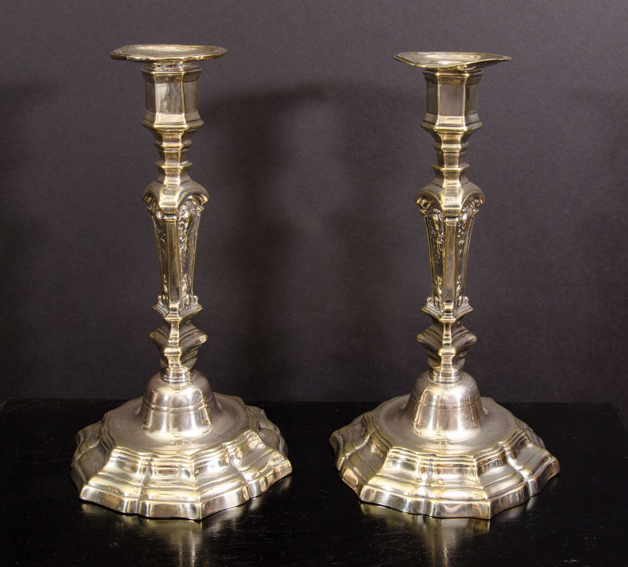 A fine pair of Louis XIV silvered bronze candlesticks in the Boulle manner.