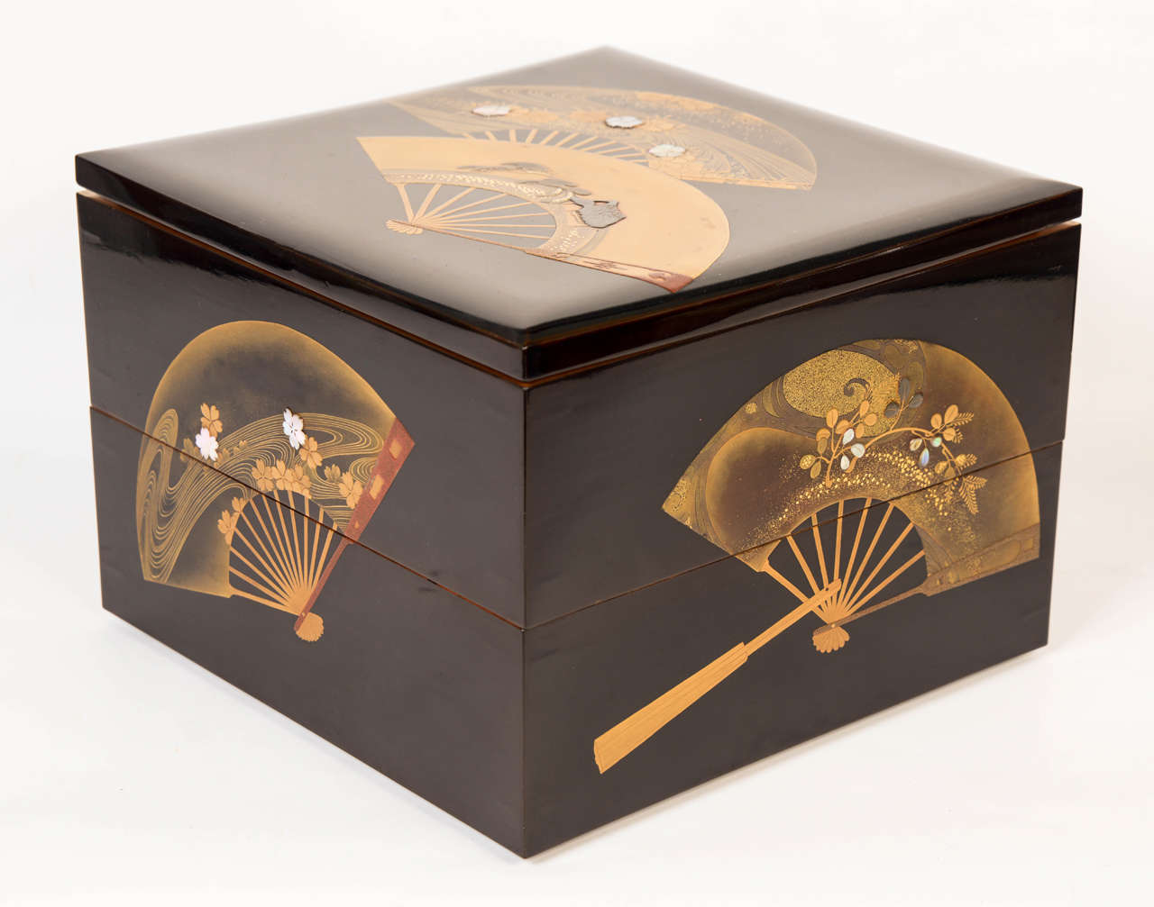Beautiful two trays jubako black lacquer with a fan decor. Each fan represents a different decor of foliage, figures, animals and ribbons with mixed metal inlays. Nashiji inside.