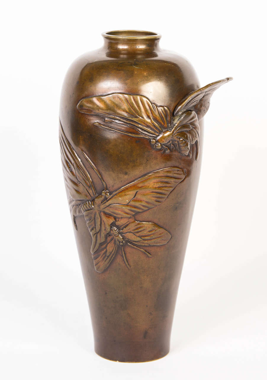 Very interesting bronze vase with a butterfly decor.