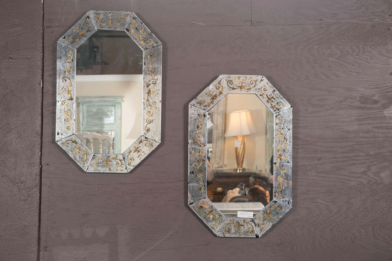 Verre églomisé octagonal mirror frame that literally reflects the technique that dates back to the pre-Roman eras. A fantastic mirror that combines reverse painting on glass derived from 18th century French decorator and art-dealer Jean-Baptiste