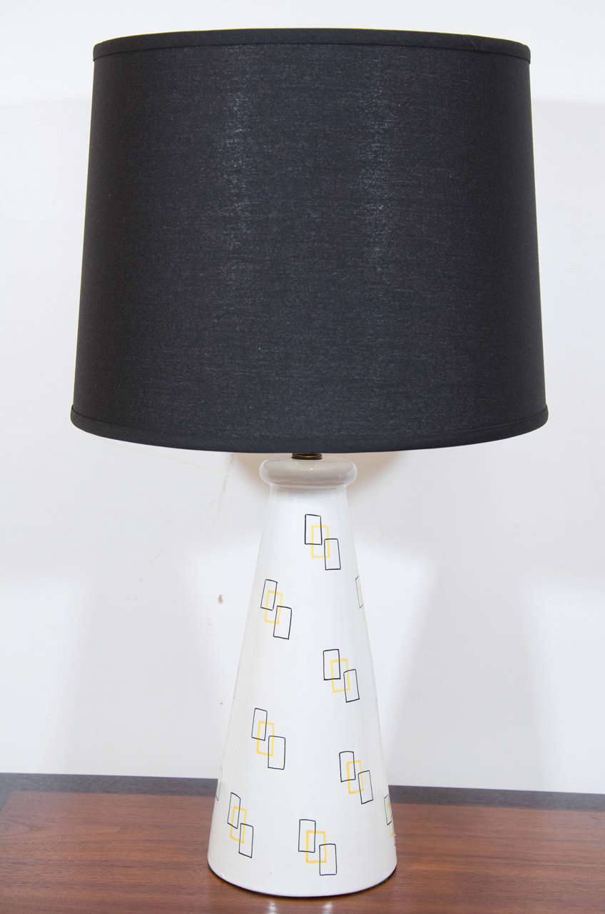 Charming pair of modernist ceramic lamps with playful graphics and a glazed finish. Please contact for location. 