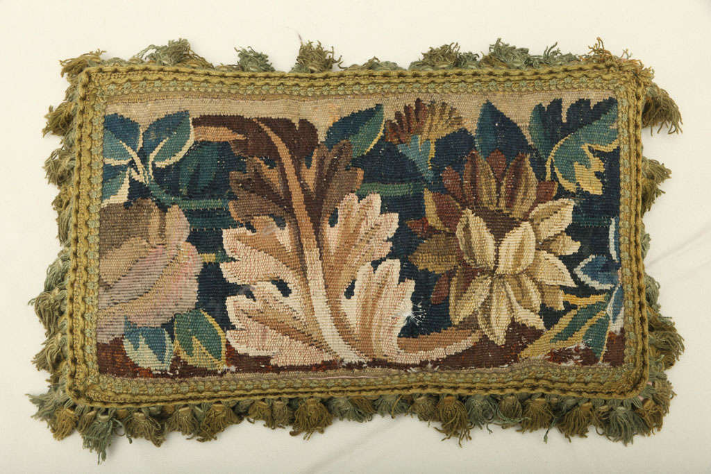 Belgian A PAIR OF VERDURE TAPESTRY FACED CUSHIONS. FLEMISH, 17th CENTURY For Sale