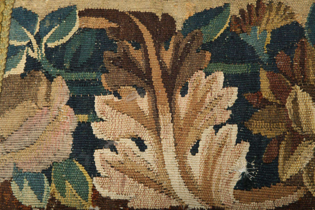 Tapestry A PAIR OF VERDURE TAPESTRY FACED CUSHIONS. FLEMISH, 17th CENTURY For Sale