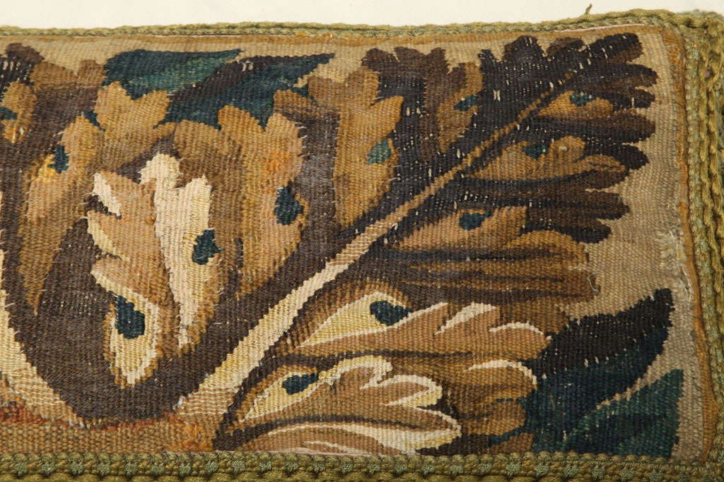 A PAIR OF VERDURE TAPESTRY FACED CUSHIONS. FLEMISH, 17th CENTURY For Sale 1