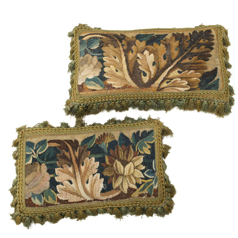 A PAIR OF VERDURE TAPESTRY FACED CUSHIONS. FLEMISH, 17th CENTURY For Sale