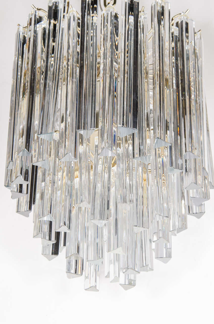 Italian Mid-Century Modernist Cascading Camer Chandelier with Polished Brass Fittings