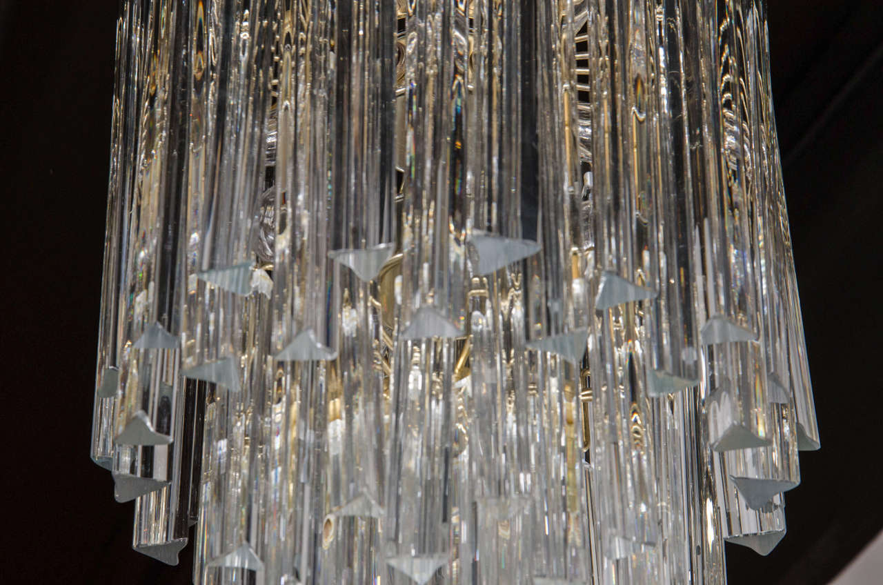 Late 20th Century Mid-Century Modernist Cascading Camer Chandelier with Polished Brass Fittings