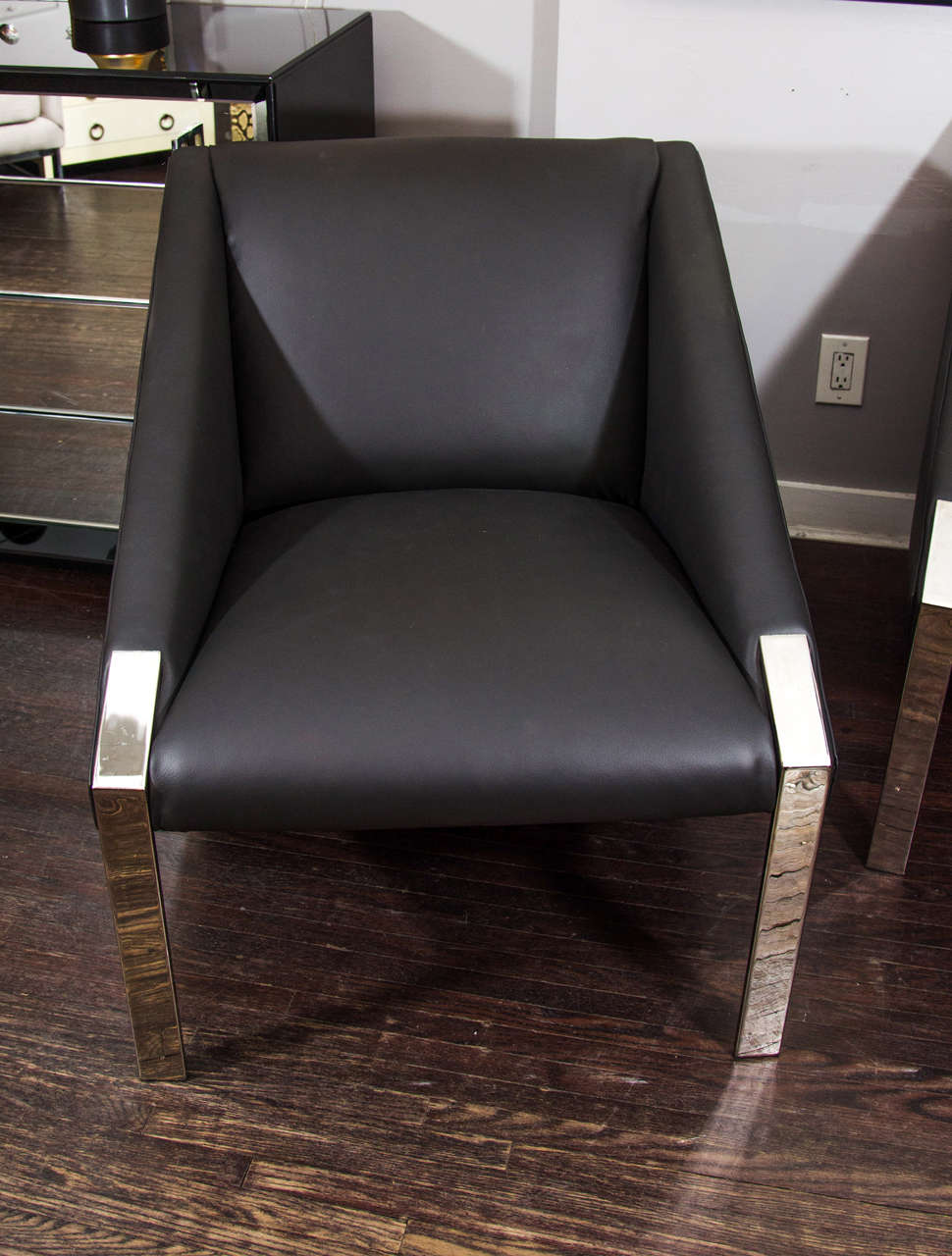 Pair of Andree Putman Chairs with Chrome Detail upholstered in Charcoal Leather