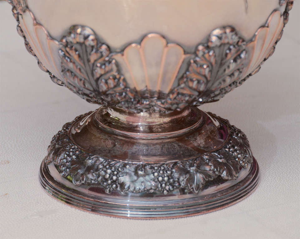 Magnificent silver wine cooler with grapes and gargoyles in relief