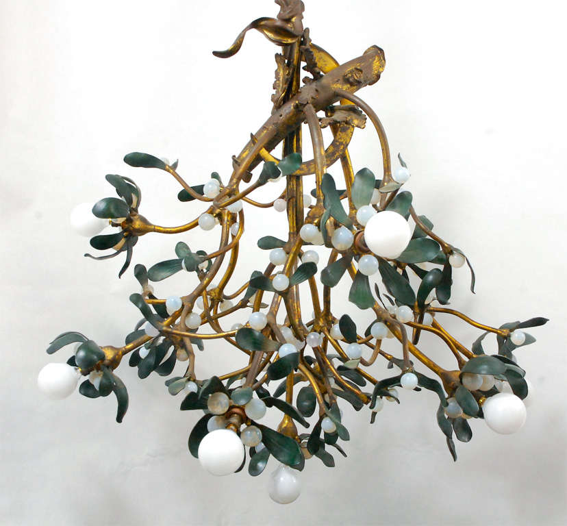 A beautiful Art Nouveau cast and cold-painted bronze mistletoe chandelier. Stamped with foundry mark 