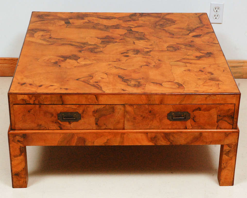 Square pear wood oyster burl coffee table with drawers for storage.  Brass campaign-style hardware.