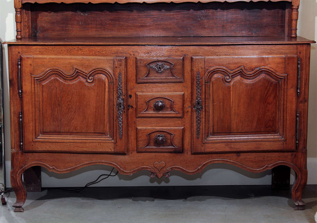 A late 18th or early 19th century large French Oak Vaisselier