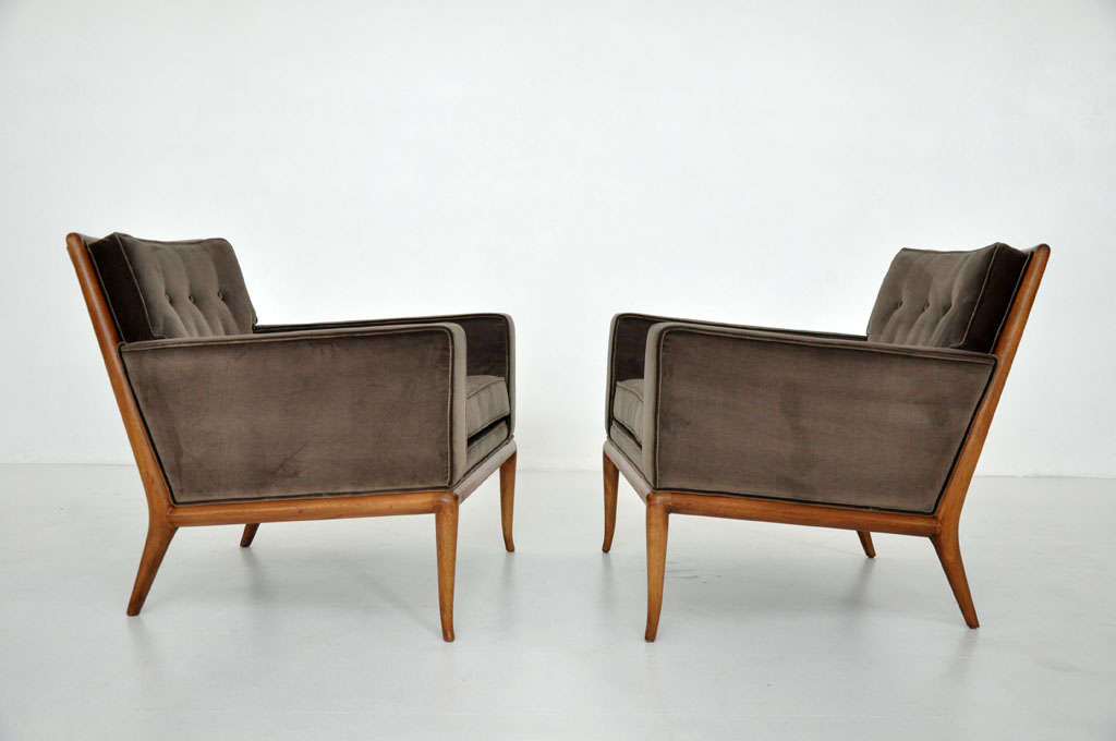 Pair of sabre leg lounge chairs by TH Robsjohn-Gibbings for Widdicomb.  Newly upholstered in velvet.  Fully restored.