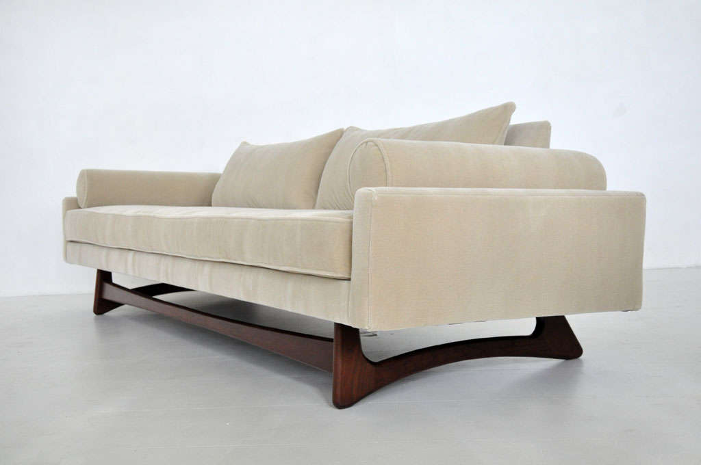 Sculptural form sofa by Adrian Pearsall.  Newly upholstered in mohair over walnut base.