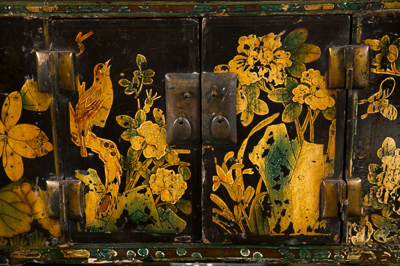 Antique chinoiserie style wooden chest, hand-painted scenes of birds and flowers, the front decorated with brass hardware. Possibly for storing herbs.