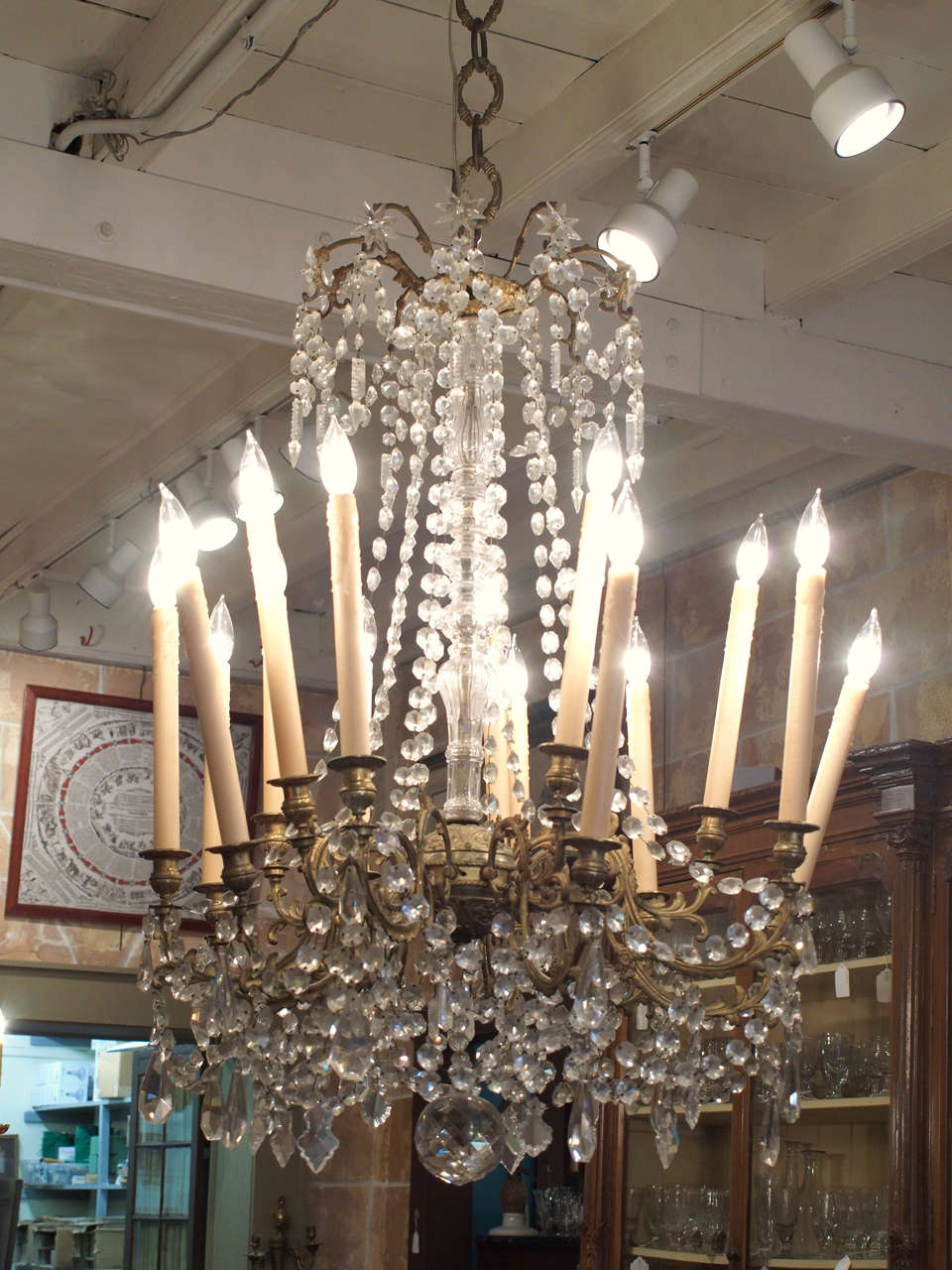 Grand early 19th century French Charles X period eighteen-arm bronze and crystal chandelier, circa 1830-1840.