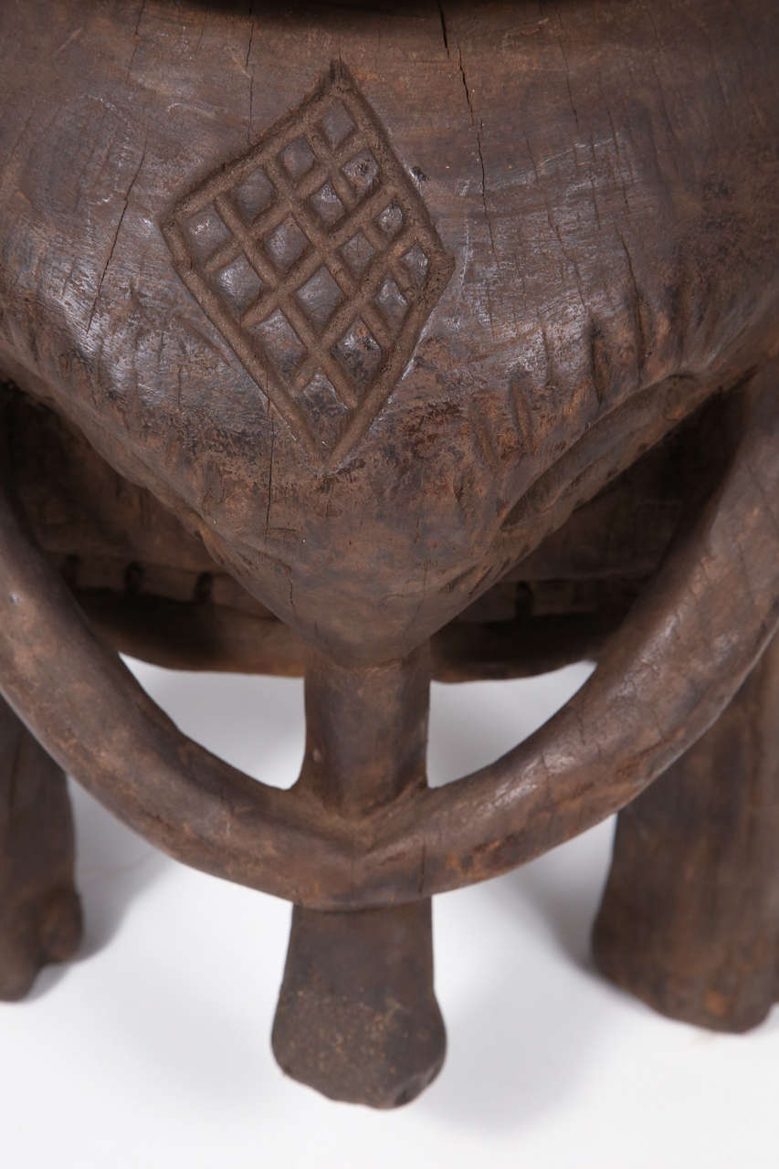 Vintage African carved wood elephant stool.