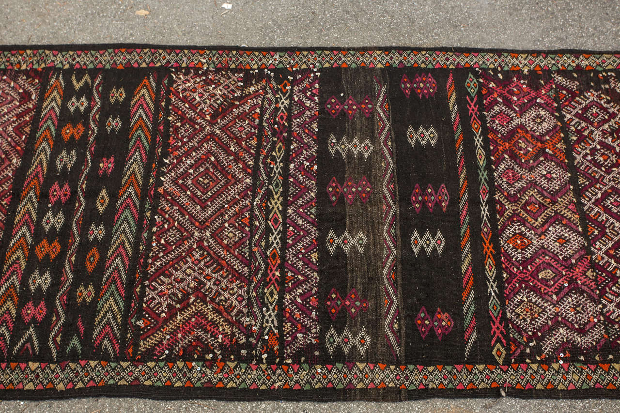 Vintage Moroccan nomadic Tuareg rug, black camel hair with wo and cotton embroidered geometrical modernist designs.Those rugs are light for easy fding and travel for the Nomadic people in the Sahara Desert of Morocco.Rare piece with beautif cor