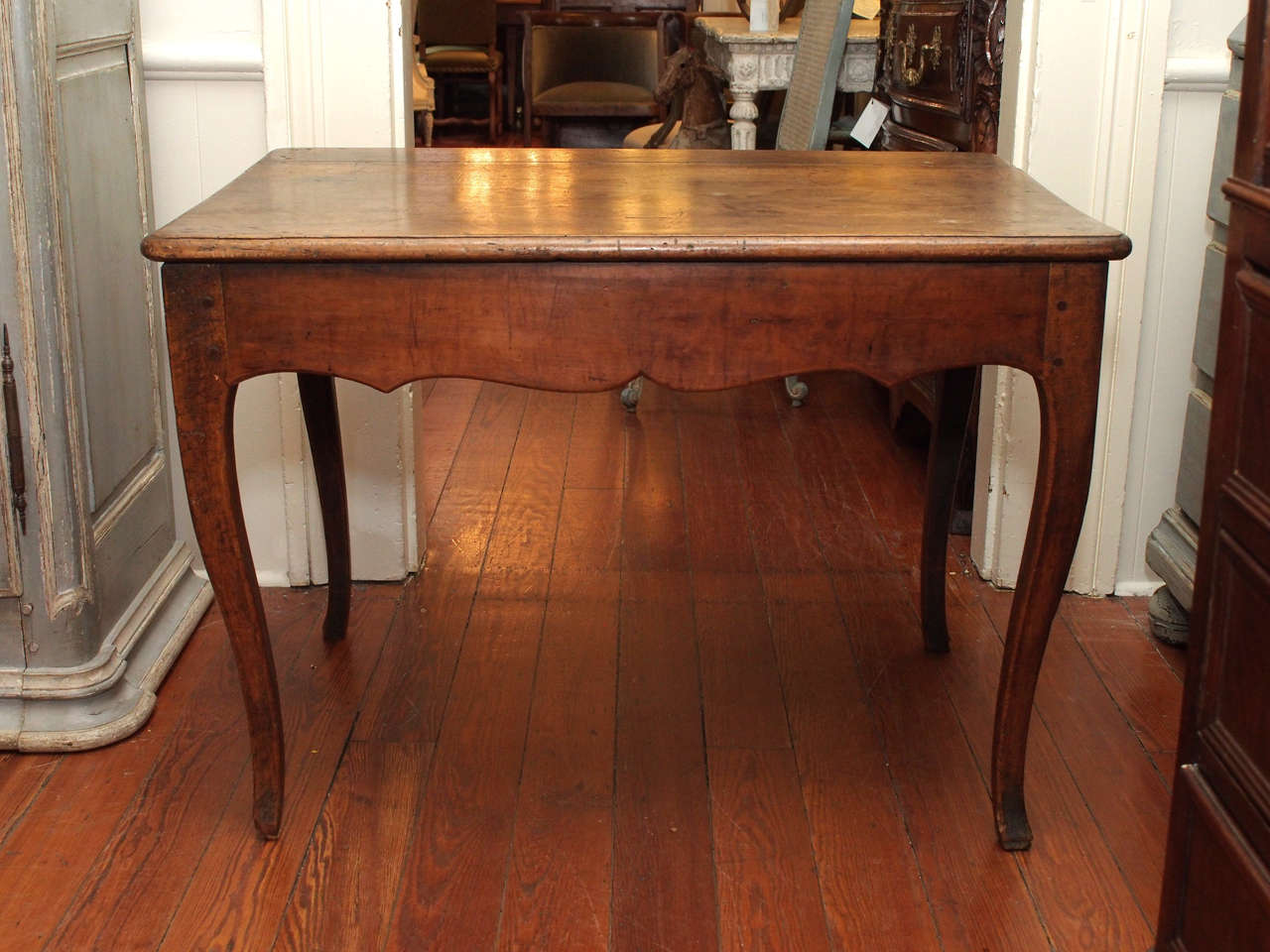 Walnut table with cabriolet  legs and one drawer. circa 1780