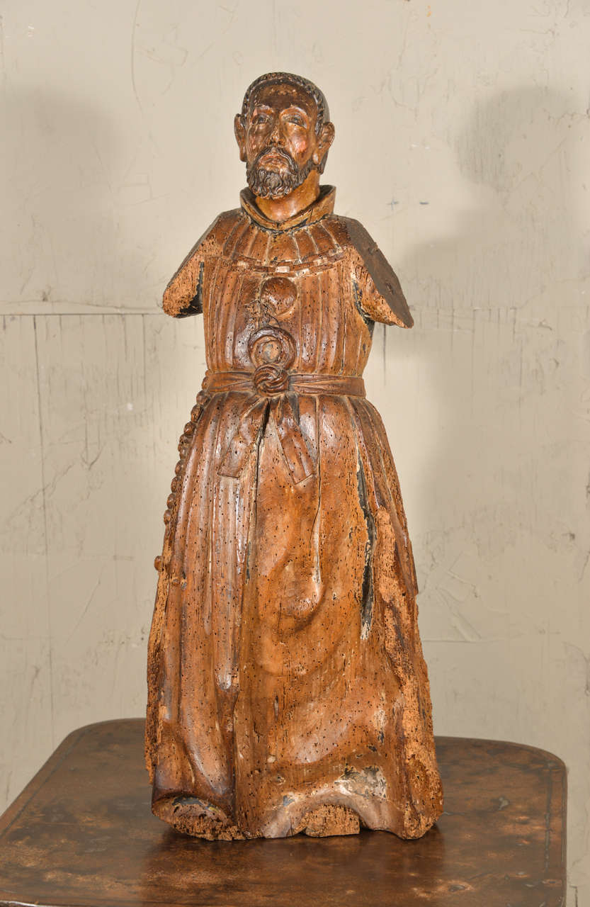 Carved figure of Franciscan abbot or saint, circa 1780-1800.
