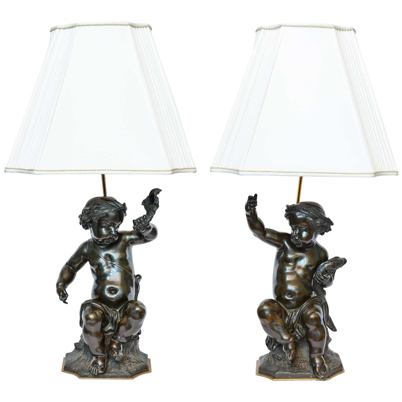 Pair of 19th Century French Patinated Bronze Statues of Putti For Sale