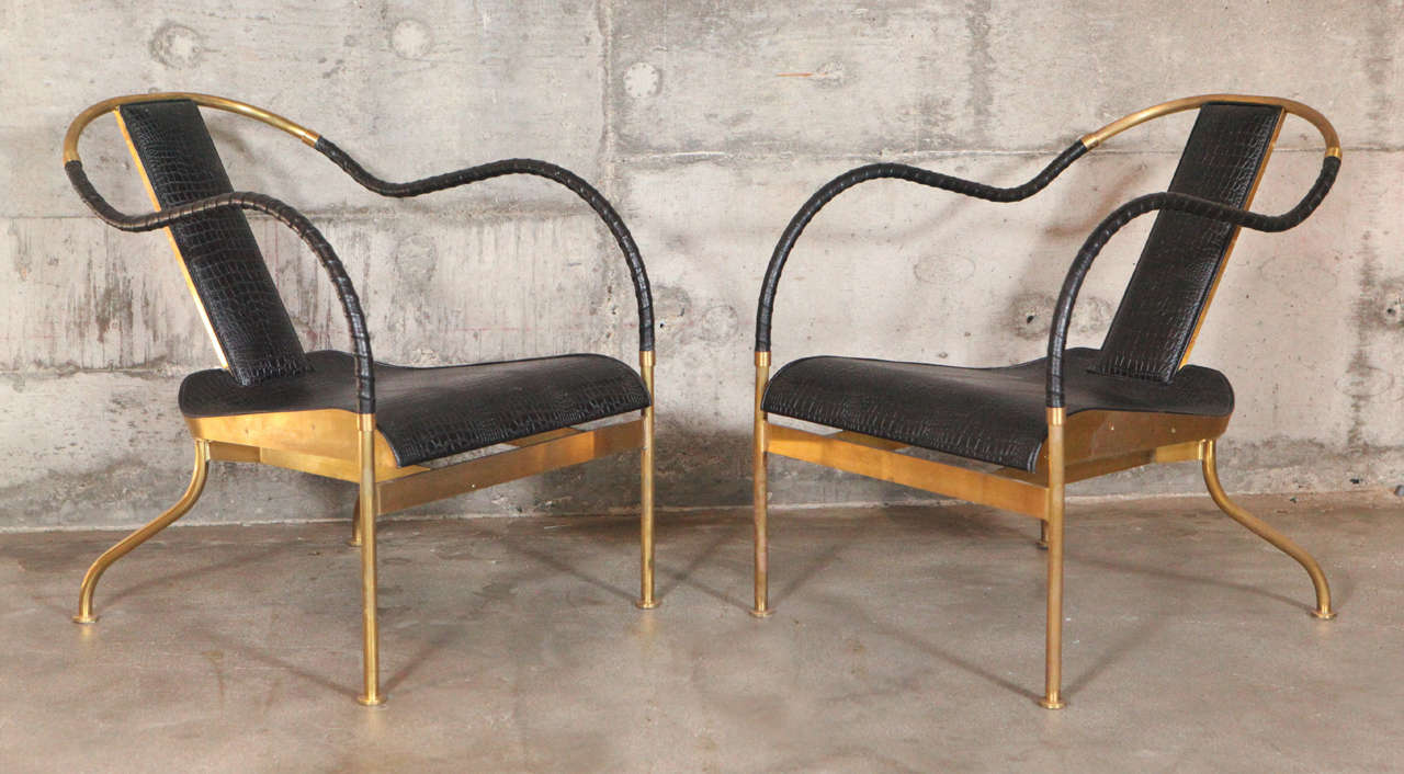 Two Mats Theselius 'EL REY' brass and leather easy chairs, Kallemo AB, Varnamo, Sweden.
Signed: el Rey by Mats Theselius 1999 by Kallemo, Sweden.