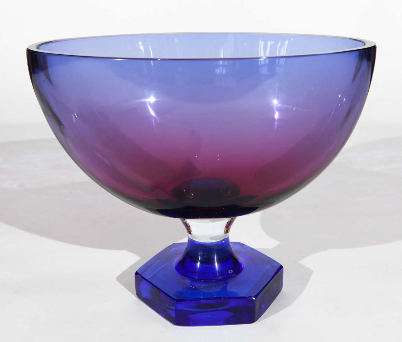 A beautiful Murano centerpiece bowl in hues of deep blue and purple. Hexagonal base with an oval shaped bowl.