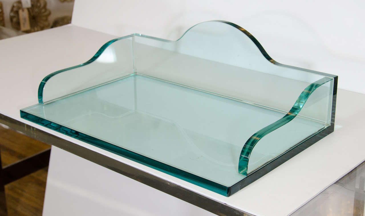 A pair of 20th century trays or shelves in heavy green colored glass. Good condition with a few nicks to glass.