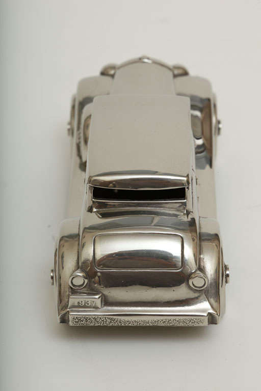 silver boxy car