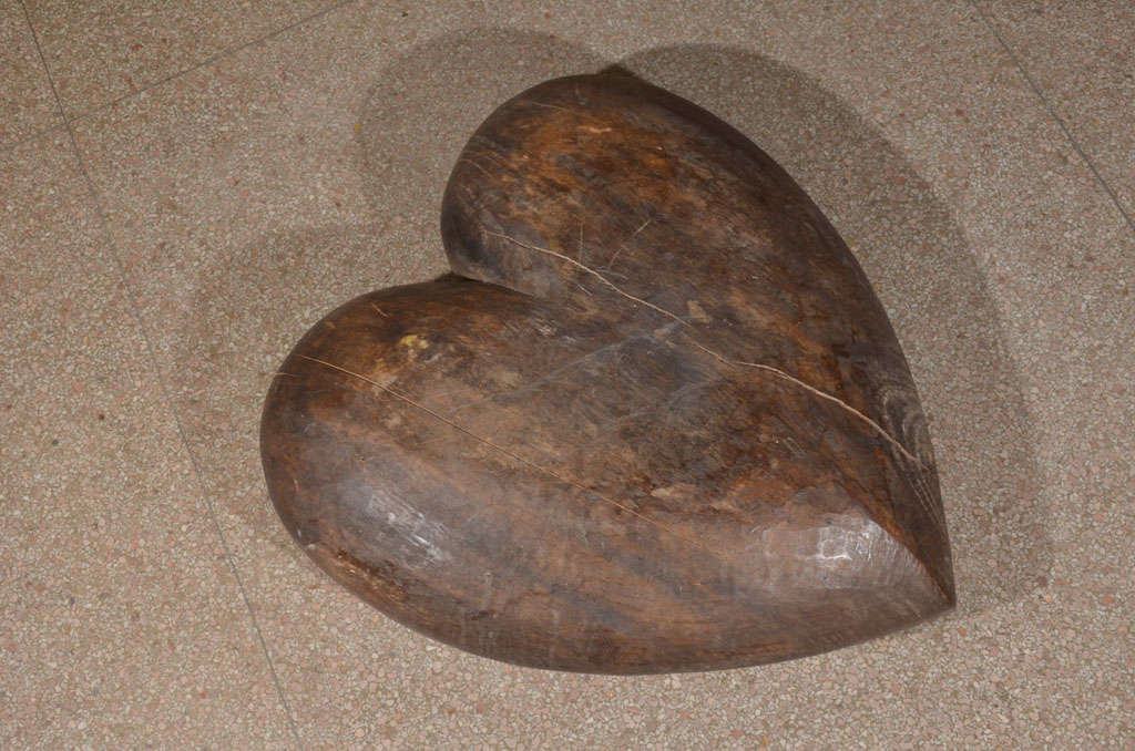 HEART IS CARVED ON ALL SIDES / IT IS CARVED SO THAT IT IS

FLATTENED ON THE BACK