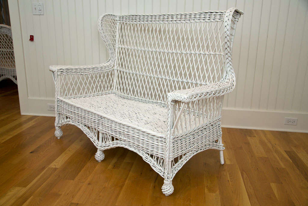 Rare Bar Harbor Wicker Wing Back Settee woven of willow with woven seat and feet.  