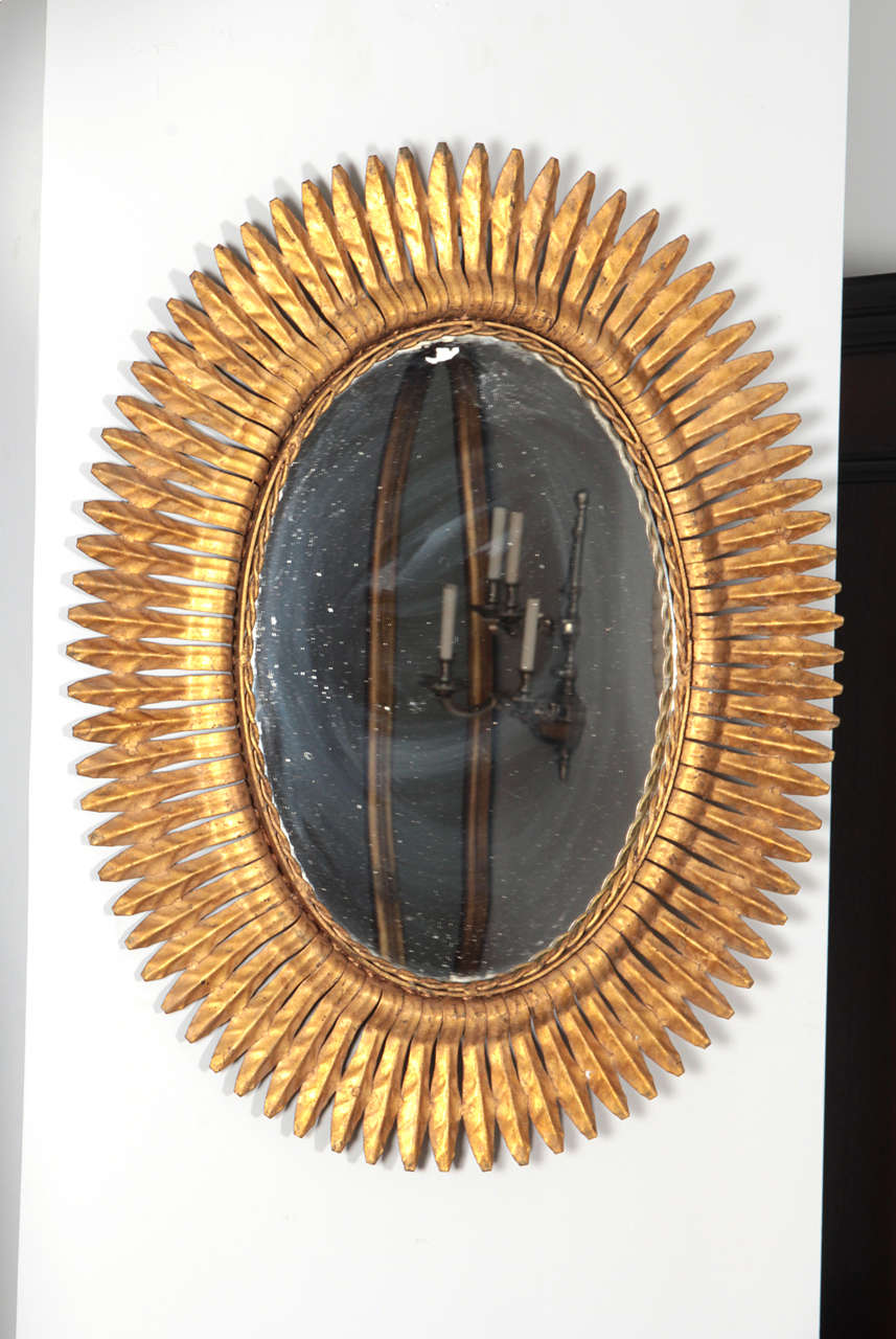 Large Spanish Gilt Metal Oval Sunburst Mirror, Circa 1950's