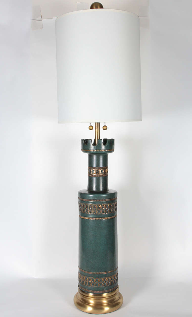 Fantastic stately pair of jade green ceramic lamps with stampato details on satin brass bases by Marbro. Lamps have been rewired and feature double pull chain sockets. Lamp body measures 24.75 inches.
