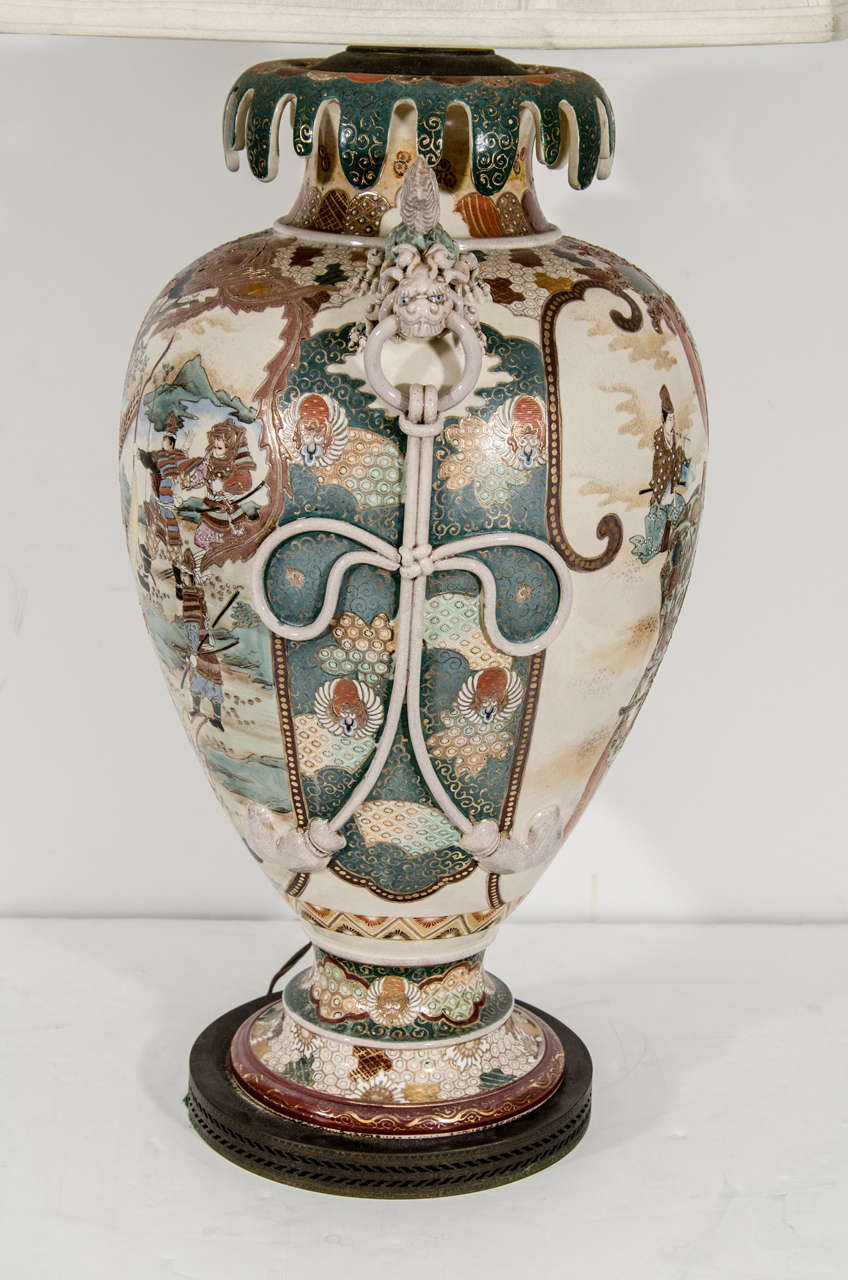 A vintage Satsuma-ware pottery lamp. The piece is in good condition with age appropriate wear; some restoration.