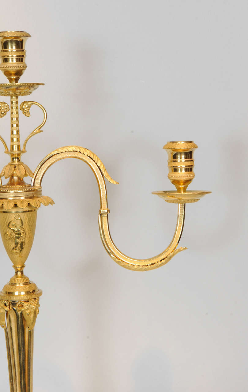 19th Century A pair of Emire ormolu three-light candelabra, circa 1810
