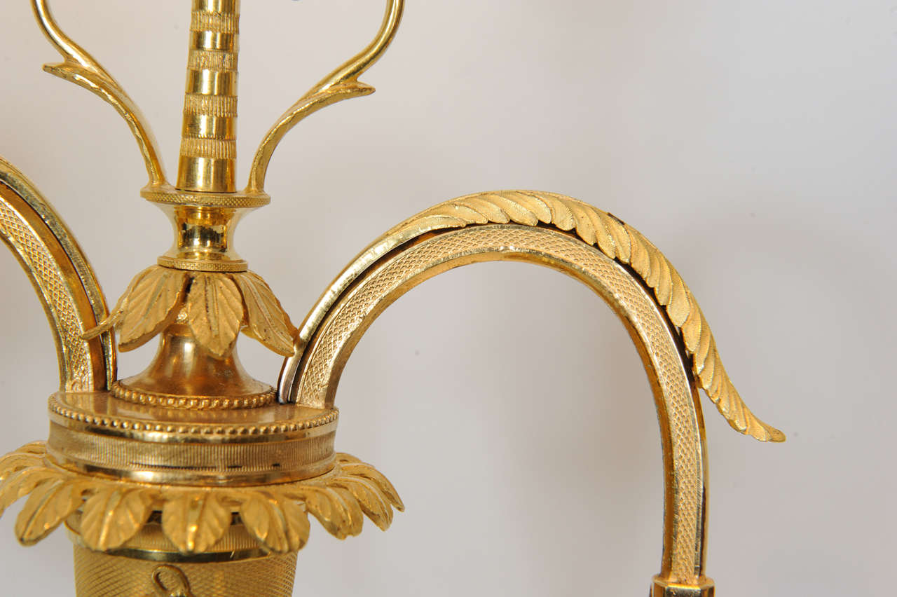 A pair of Emire ormolu three-light candelabra, circa 1810 3