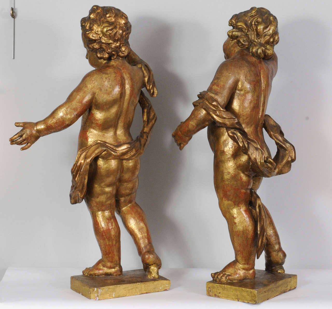 18th Century and Earlier A pair of Dutch giltwood figures of putti, circa 1660 For Sale