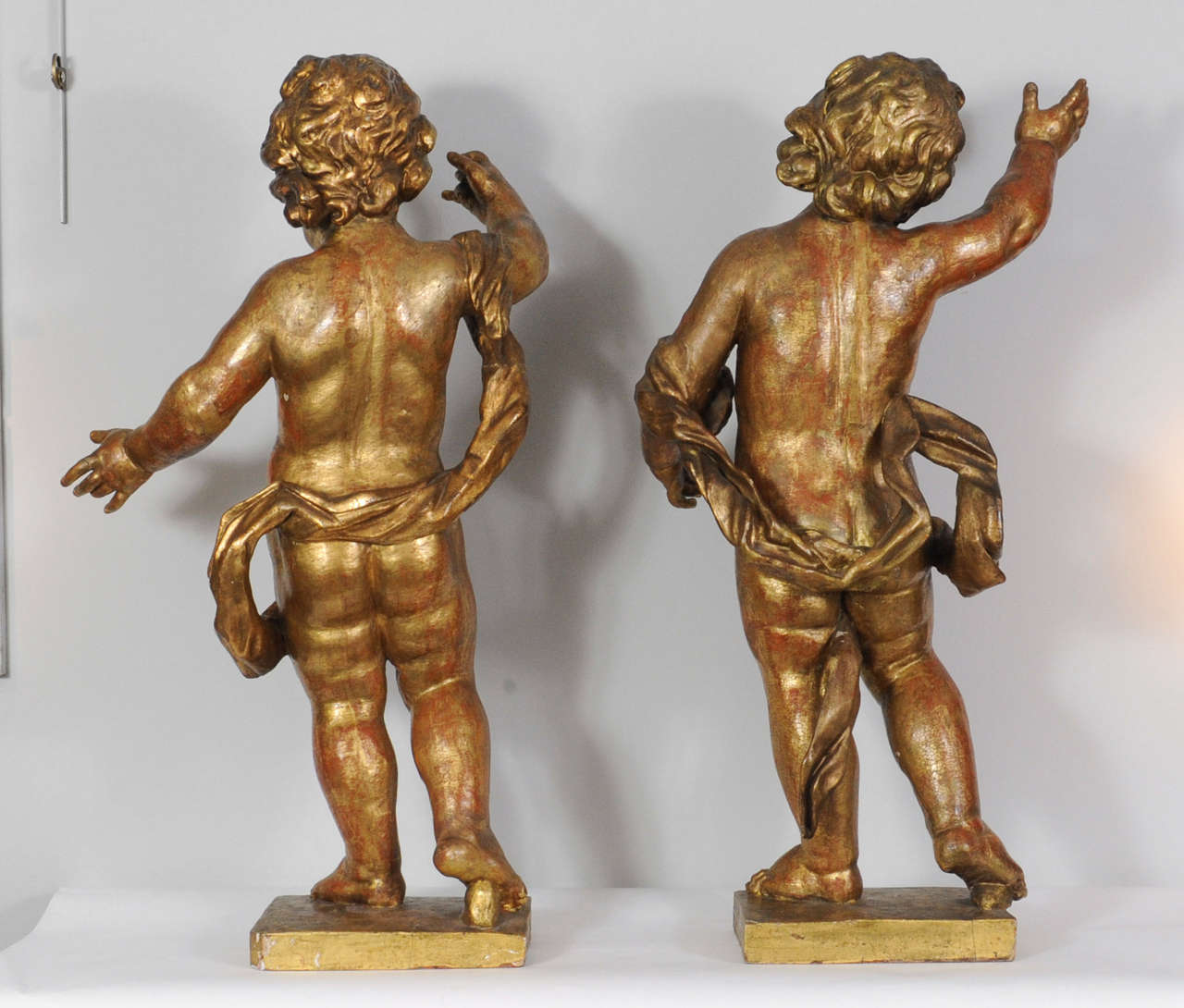 Giltwood A pair of Dutch giltwood figures of putti, circa 1660 For Sale