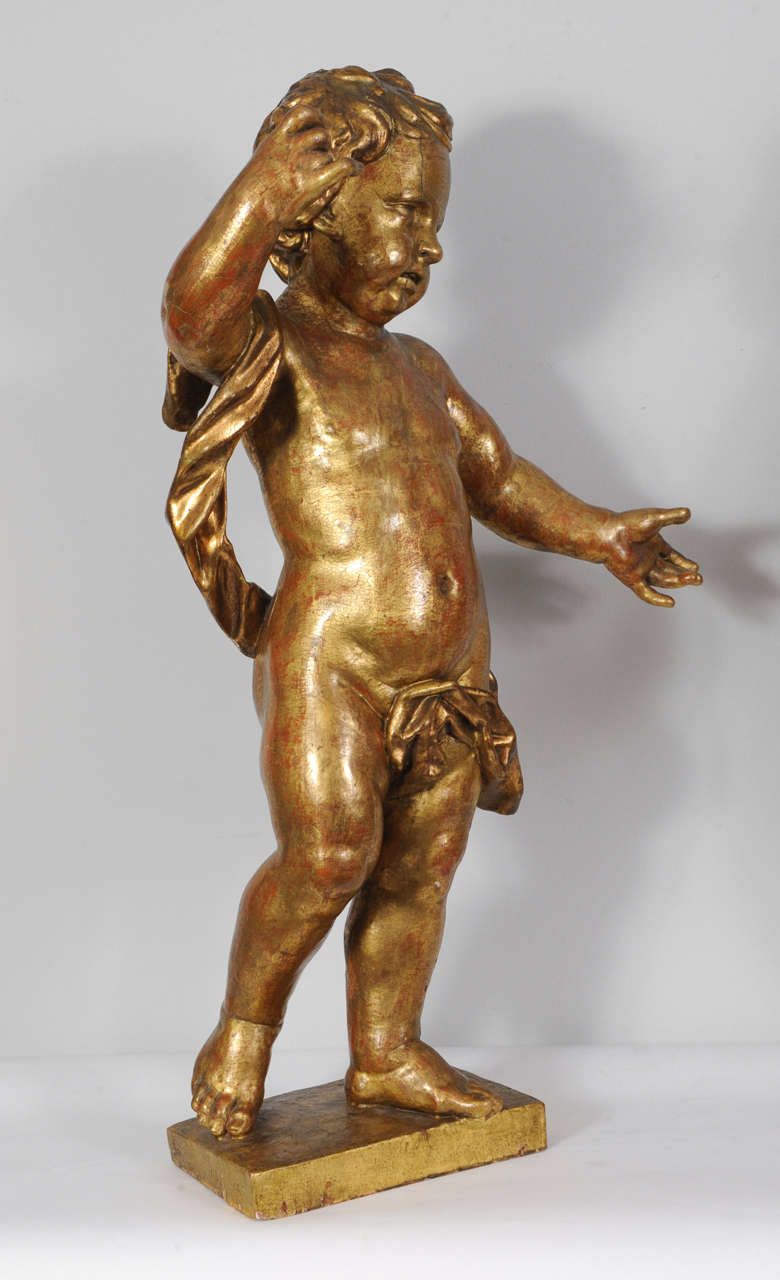 A pair of Dutch giltwood figures of putti, circa 1660 For Sale 2