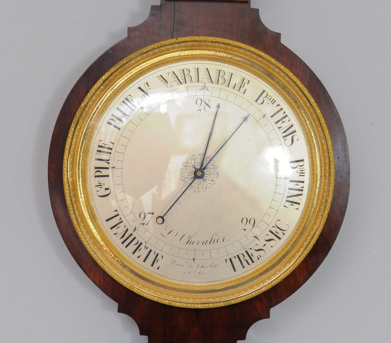 French A near pair of pendant Empire mahogany wall clock and barometer, circa 1820 For Sale